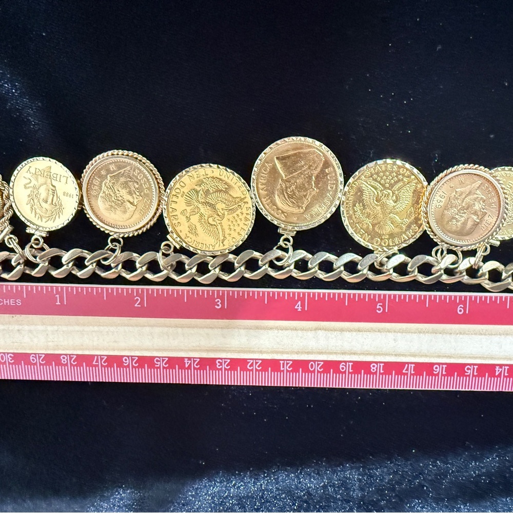 14K Gold women’s collector coin bracelet